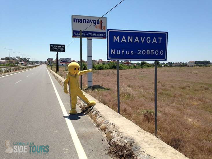 How far is Side from Antalya airport